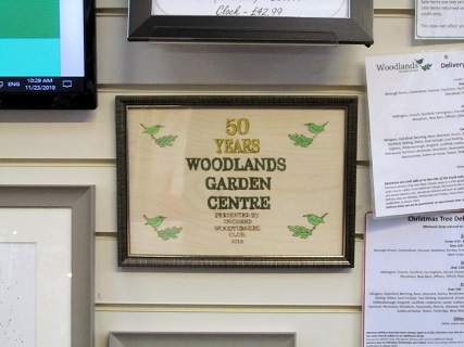 Plaque presented to Woodlands Garden Center 50th anniversary